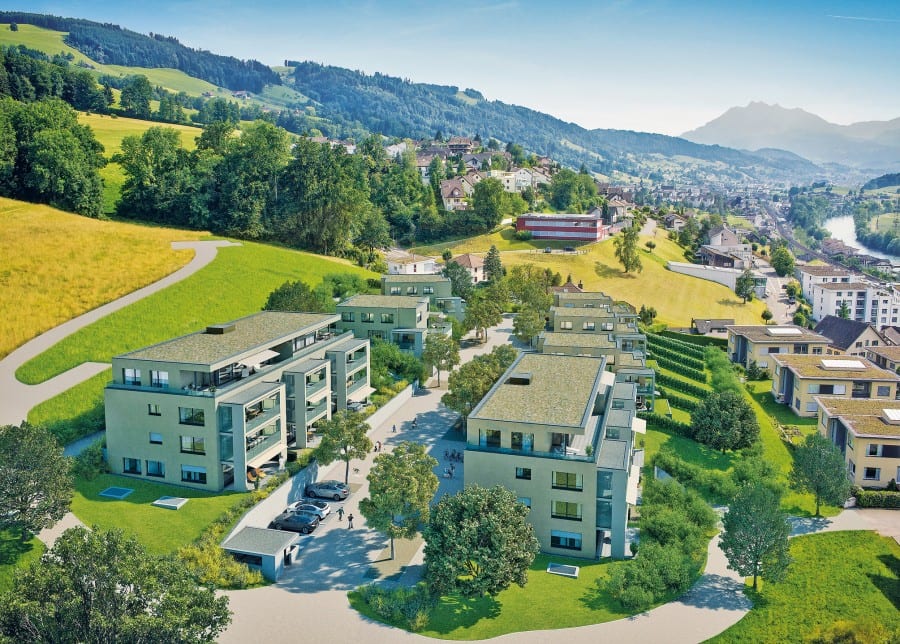 Das neue Wohnquartier Feldhof liegt an erhöhter Lage in Gisikon. In der ersten Etappe realisiert die Alfred Müller AG 20 Eigentumswohnungen und 10 Doppeleinfamilienhäuser.