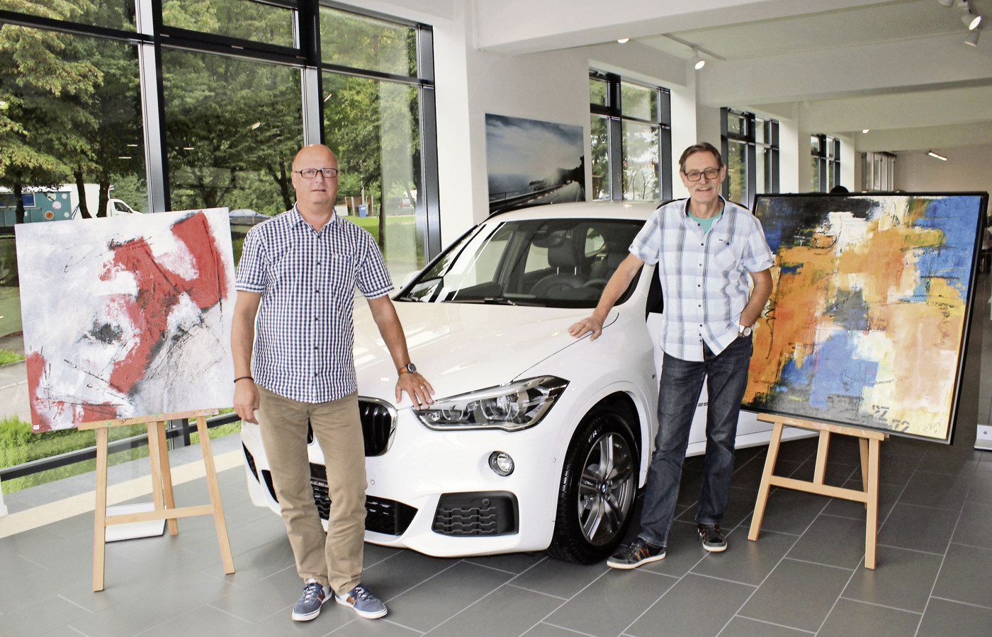 Kurt Imgrüth und Peter Rüegger bereichern die BMW-Herbstausstellung mit ihren grossformatigen Gemälden.